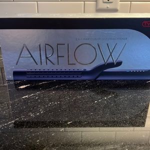 New but open box Tymo airflow, two in one hair curler and straightener